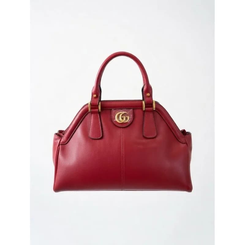 Çante Gucci e kuqe me detaje gold